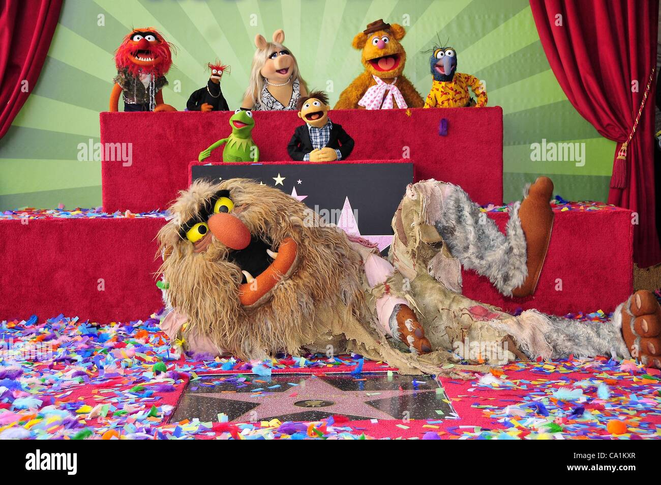 Animal, Pepe, Kermit, Sweetums, Miss Piggy, Walter, Fozzie, Gonzo at the induction ceremony for Star on the Hollywood Walk of Fame forThe Muppets, Hollywood Boulevard, Los Angeles, CA March 20, 2012. Photo By: Michael Germana/Everett Collection Stock Photo