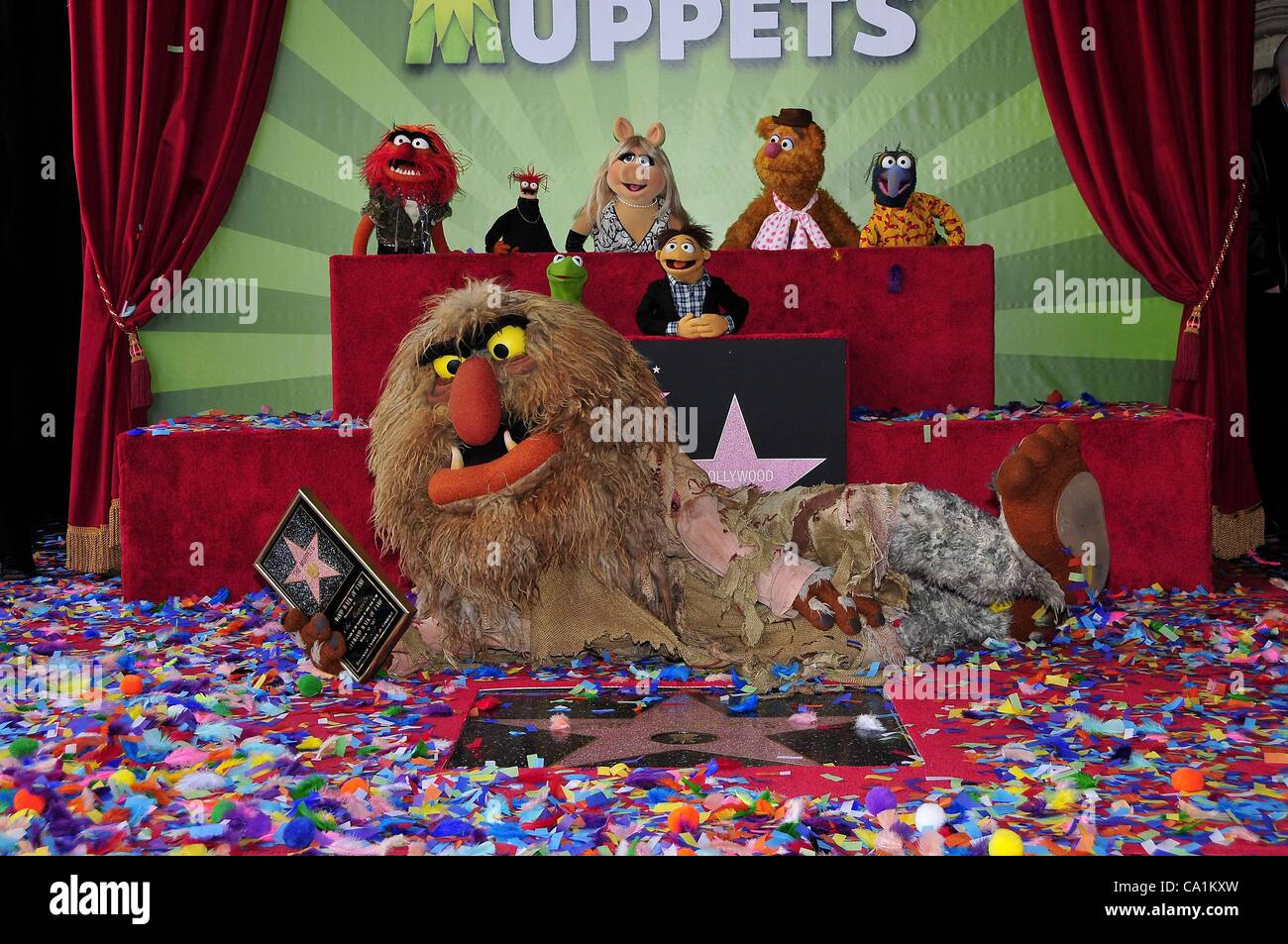 Animal, Pepe, Kermit, Sweetums, Miss Piggy, Walter, Fozzie, Gonzo at the induction ceremony for Star on the Hollywood Walk of Fame forThe Muppets, Hollywood Boulevard, Los Angeles, CA March 20, 2012. Photo By: Michael Germana/Everett Collection Stock Photo