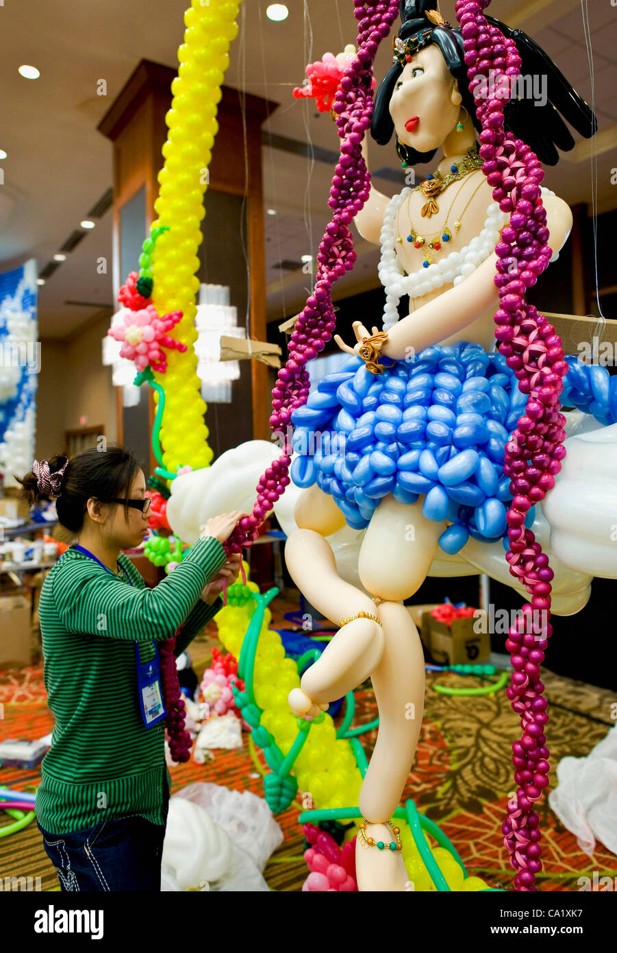 Dallas Texas Us Mar 21 12 A Balloon Artist From The Miracle Atelier Company In Hong Kong Works On The Sculpture Peace During The Biennial World Balloon Convention At The Sheraton Dallas