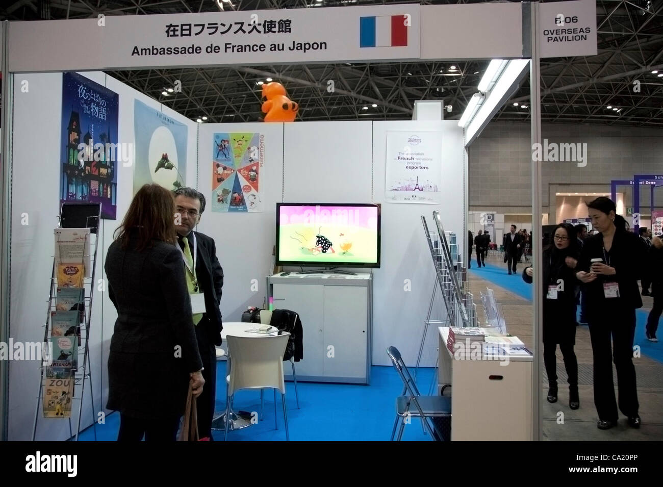 March 22, 2012, Tokyo, Japan - Staff of the Ambassade de France au Japan's pavilion at TAF. The fist business day of the Tokyo International Anime Fair (TAF) , 11th Anniversary. Stock Photo
