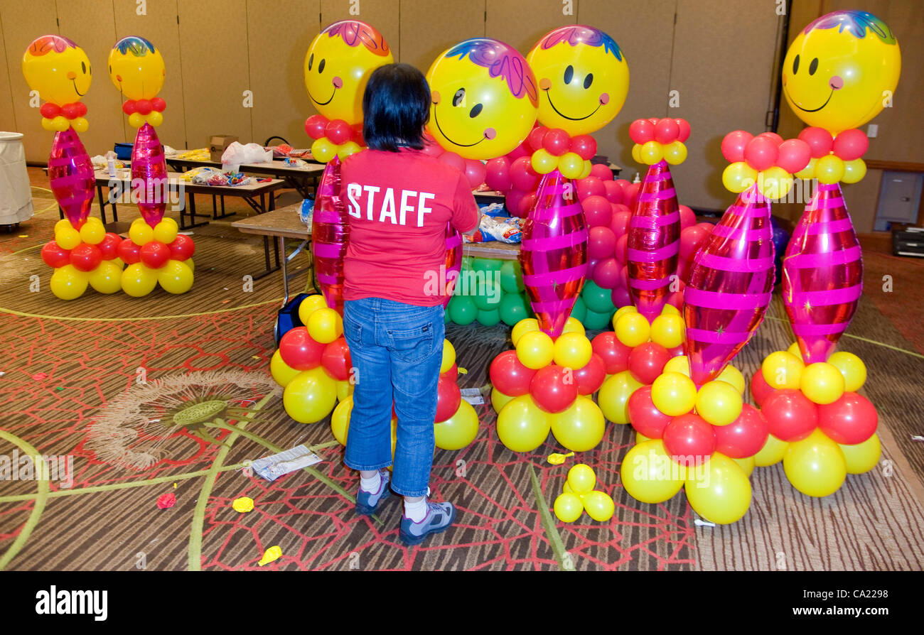 March 22, 2012 - Dallas, Texas, USA -  Balloon decorations are prepared for the evening's costume party during the biennial World Balloon Convention at the Sheraton Dallas Hotel.  Attended by approximately 700 balloon artistry delegates and competitors from 46 countries, the WBC features sculptire c Stock Photo