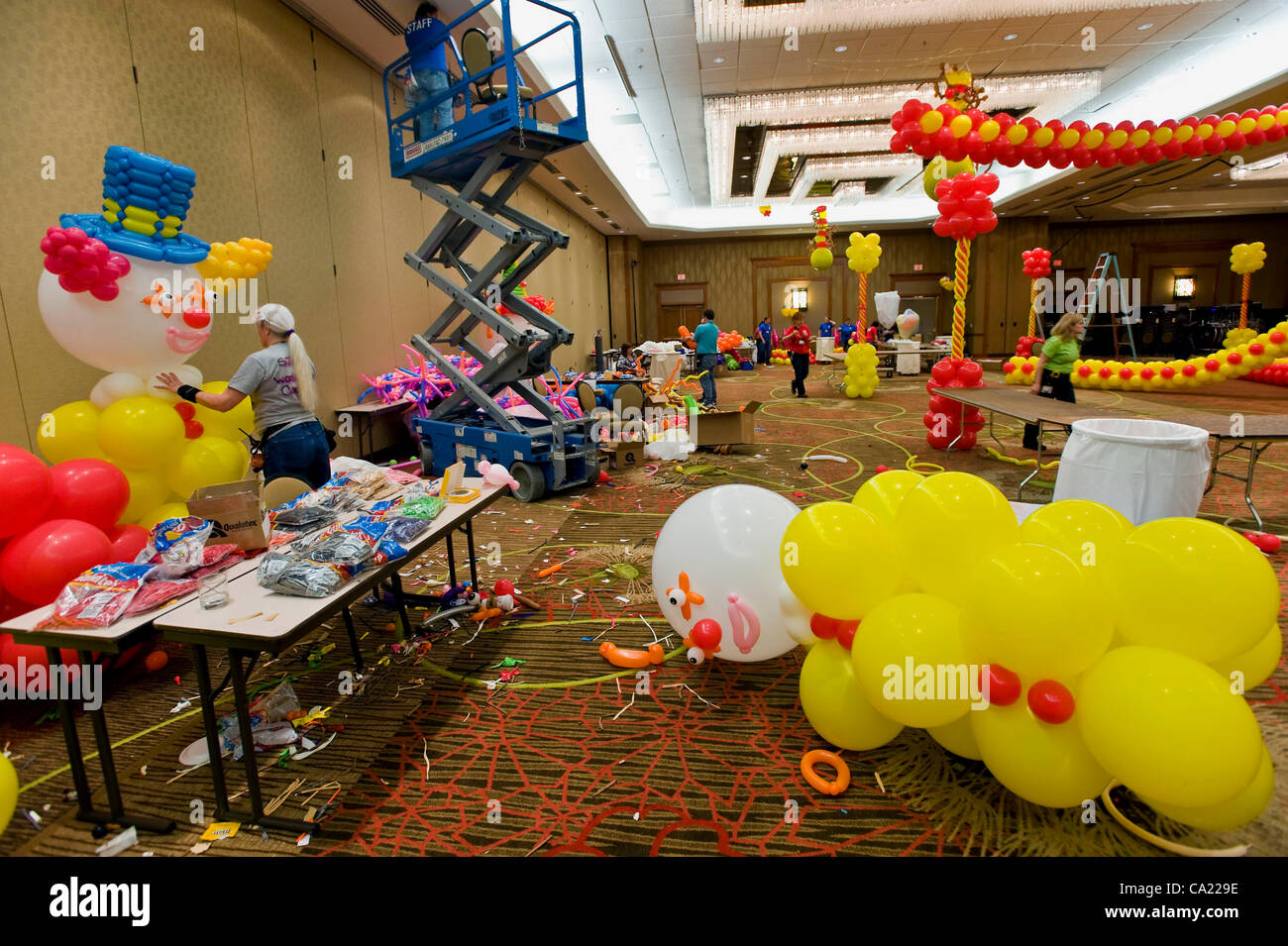 March 22, 2012 - Dallas, Texas, USA -  Decorations are readied for the evening's costume party during the biennial World Balloon Convention at the Sheraton Dallas Hotel.  Attended by approximately 700 balloon artistry delegates and competitors from 46 countries, the WBC features sculptire contests,  Stock Photo