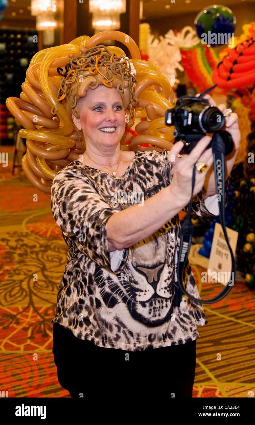 March 22, 2012 - Dallas, Texas, USA -   Balloon artists attend the circus-themed costume party during the biennial World Balloon Convention at the Sheraton Dallas Hotel.  Attended by approximately 700 balloon artistry delegates and competitors from 46 countries, the WBC features sculptire contests,  Stock Photo