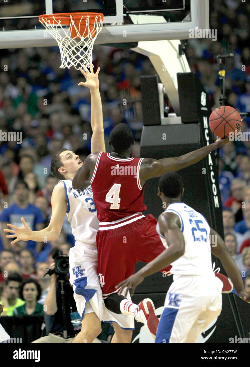 March 23, 2012 - Atlanta, GA, USA - Indiana Hoosiers guard Victor Oladipo (4) scored on a drive into Kentucky Wildcats forward Kyle Wiltjer (33) as the University of Kentucky played Indiana University in the NCAA South Regional semifinal the Georgia Dome in Atlanta, Ga., Friday, March 23, 2012.  Thi Stock Photo