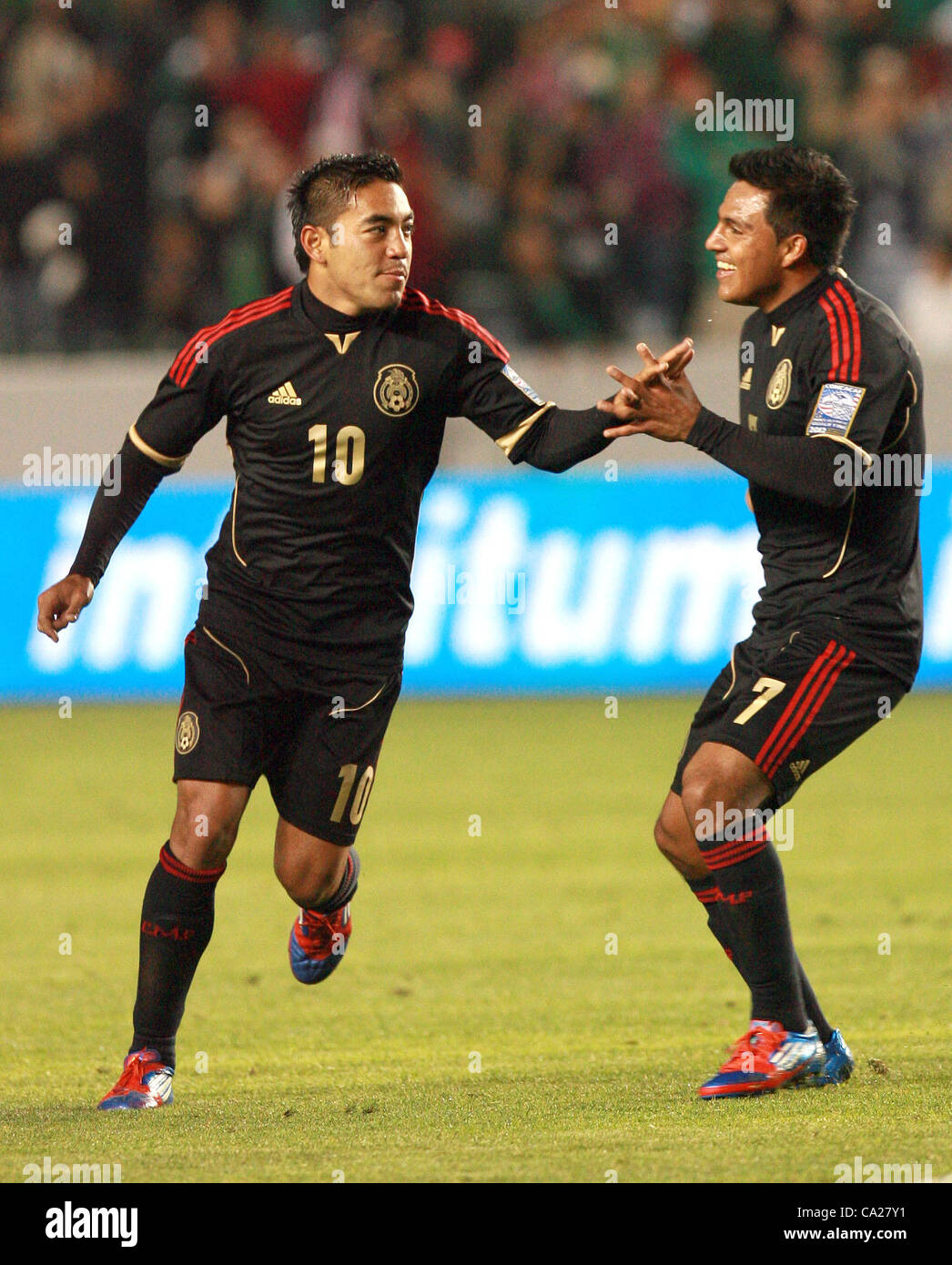 March 23, 2012 - Los Angeles, California, U.S. - Mexico's Marco Fabian, left,  celebrates with his teammate Javier Cortes after his third goal during the second of a 2012 CONCACAF Men's Olympic Qualifying game at The Home Depot Center on March 23, 2012 in Carson, California. Mexico won Trinidad & To Stock Photo