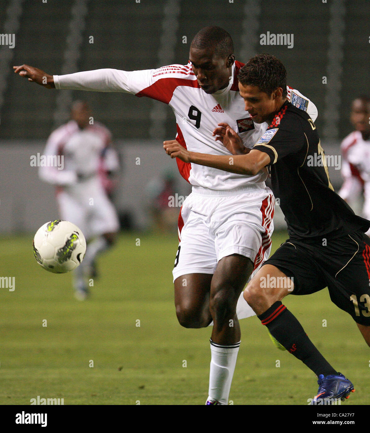 March 23, 2012 - Los Angeles, California, U.S. - Trinidad & Tobago's Jamal Gay (L) and Mexico's Diego Reyes battle for the ball during the first half of a 2012 CONCACAF Men's Olympic Qualifying game at The Home Depot Center on March 23, 2012 in Carson, California. (Credit Image: © Ringo Chiu/ZUMAPRE Stock Photo