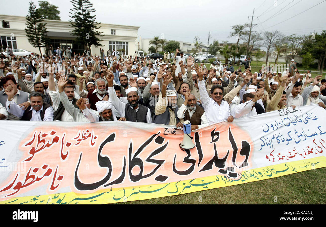 Members of WAPDA Hydro Electric Central Labor Union are protesting in favor of their demands during demonstration at WAPDA House in Peshawar on Tuesday, March 27, 2012. Stock Photo