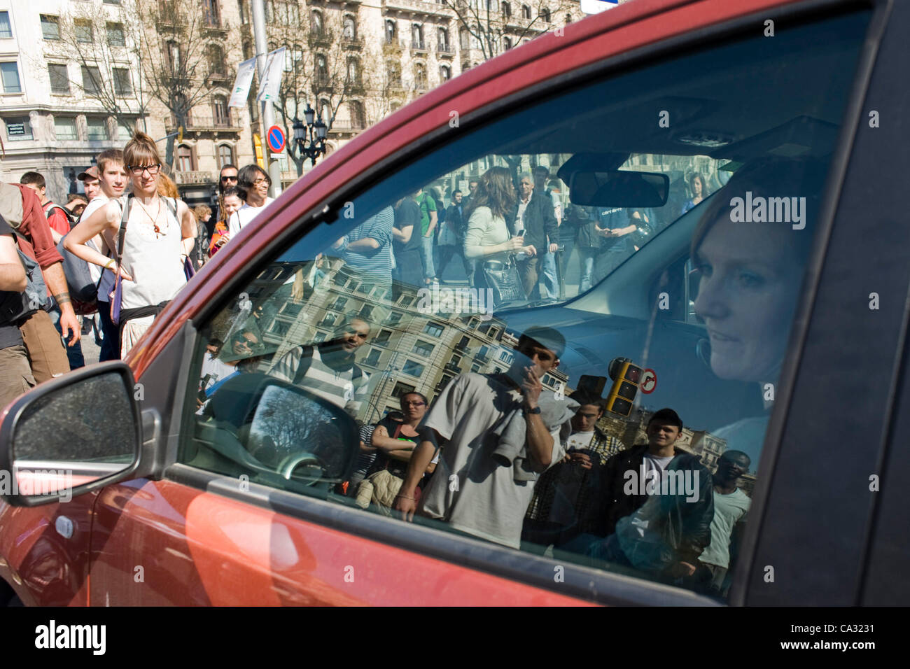 29 march, 2012 - Barcelona, Catalonia, Spain. A driver is stopped for pickets in the center of Barcelona during the general strike in Spain by the application of the new labor reform. Stock Photo
