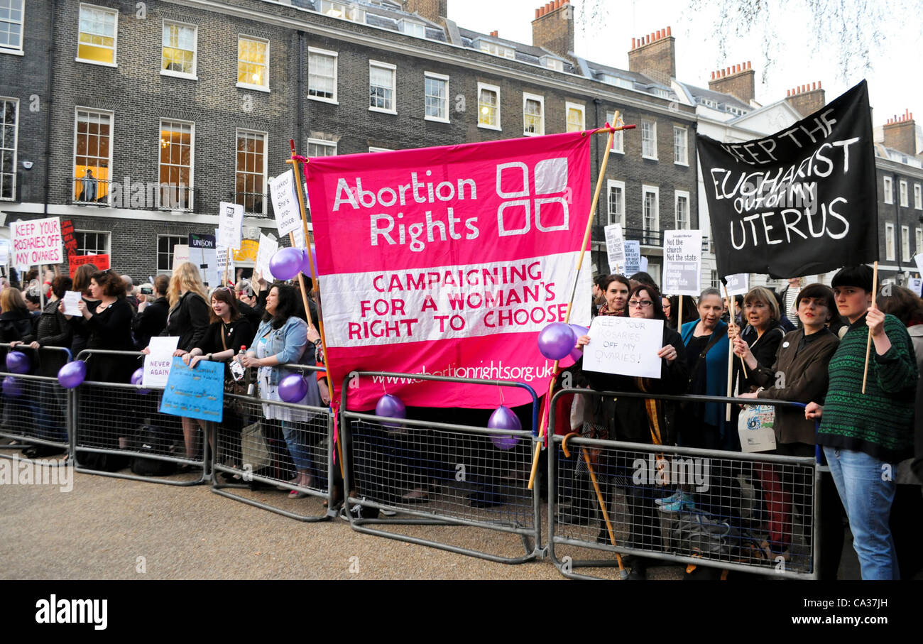 London, UK. 30/03/12. As Pro-Life and Anti-Abortion campaigners held prayers outside the British Pregnancy Advisory Service in Bedford Square, these Pro-Choice campaigners held a counter demonstration. Stock Photo