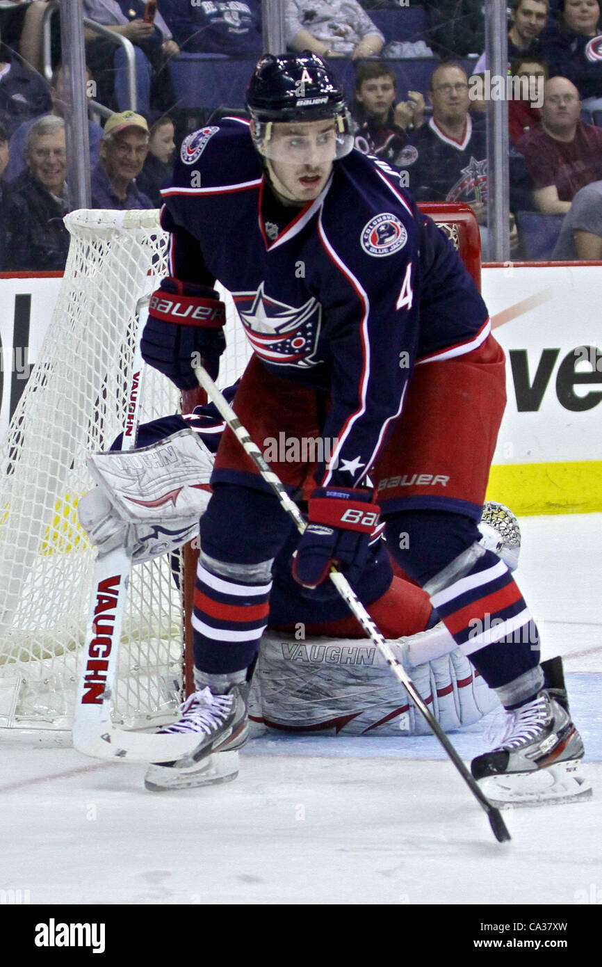 March 30, 2012 - Columbus, Ohio, U.S - Columbus Blue Jackets defenseman John Moore (4) defends in front of the net in the second period of the game between the Florida Panthers and Columbus Blue Jackets at Nationwide Arena, Columbus, Ohio. (Credit Image: © Scott Stuart/ZUMAPRESS.com) Stock Photo