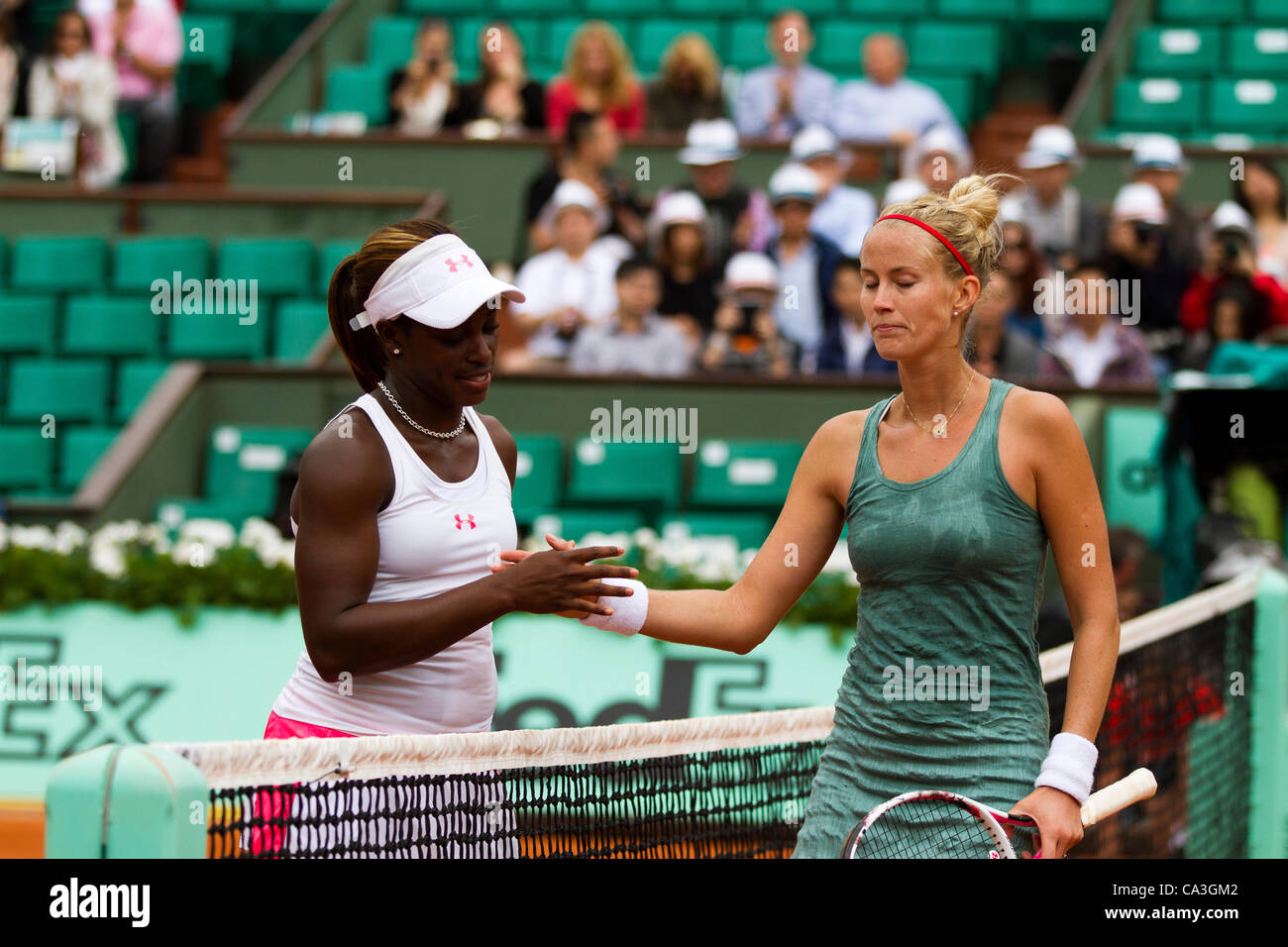 01.06.2012 Paris, France. Sloane Stephens and Mathilde Johansson shake ...