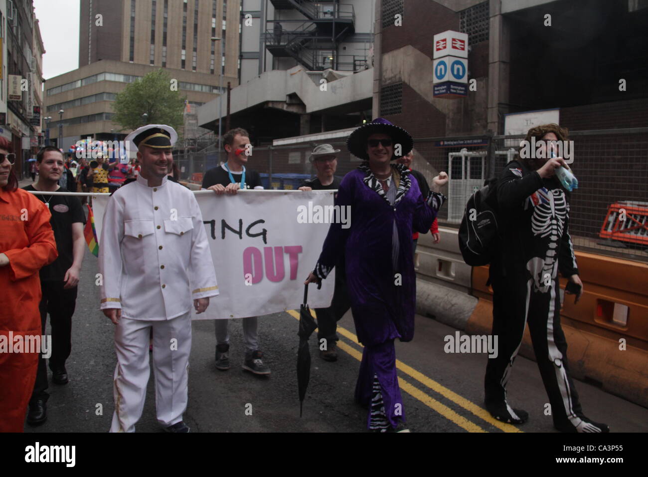 People dressed in different costumes at Birmingham Pride in Birmingham