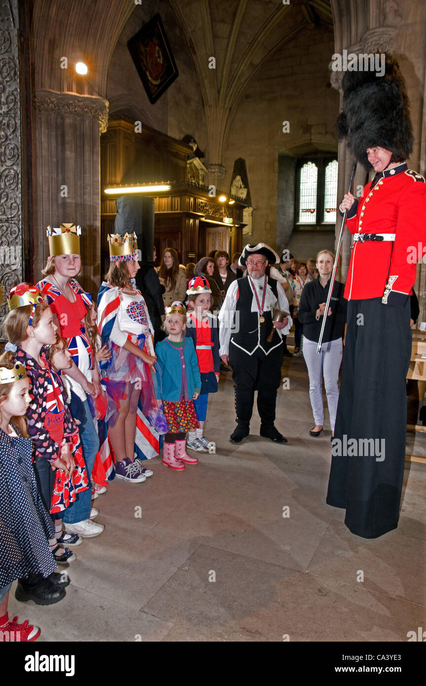 Ten foot tall lady wearing Grenadier Guards stile uniform judging the