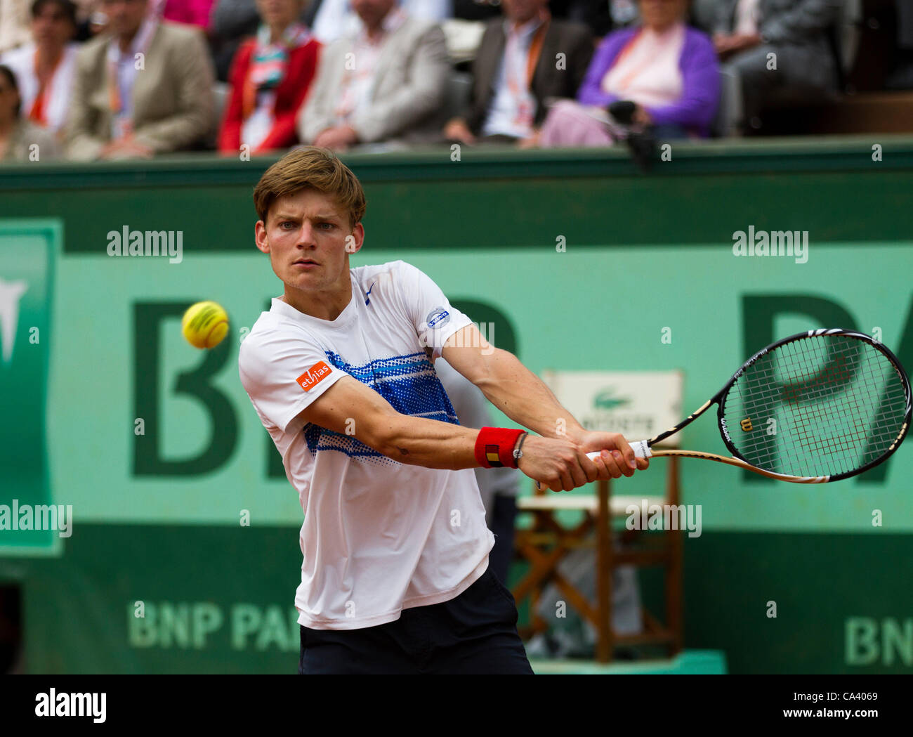 03.06.2012 Paris, France. David Goffin in action against Roger Federer on day 8 of the French Open Tennis from Roland Garros. Stock Photo