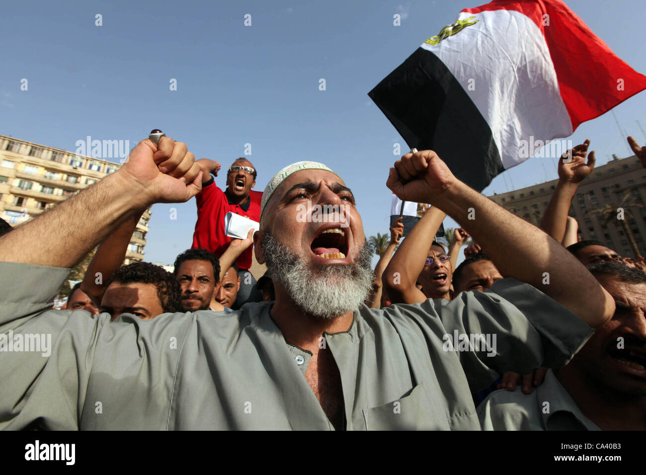 June 3, 2012 - Cairo, Egypt - Egyptian protesters demonstrate a day after a court sentenced deposed president Hosni Mubarak to life in prison, at Tahrir Square. Egyptian pro-democracy campaigners called for a new uprising on Sunday, enraged that a court had spared Mubarak his life over the killing o Stock Photo
