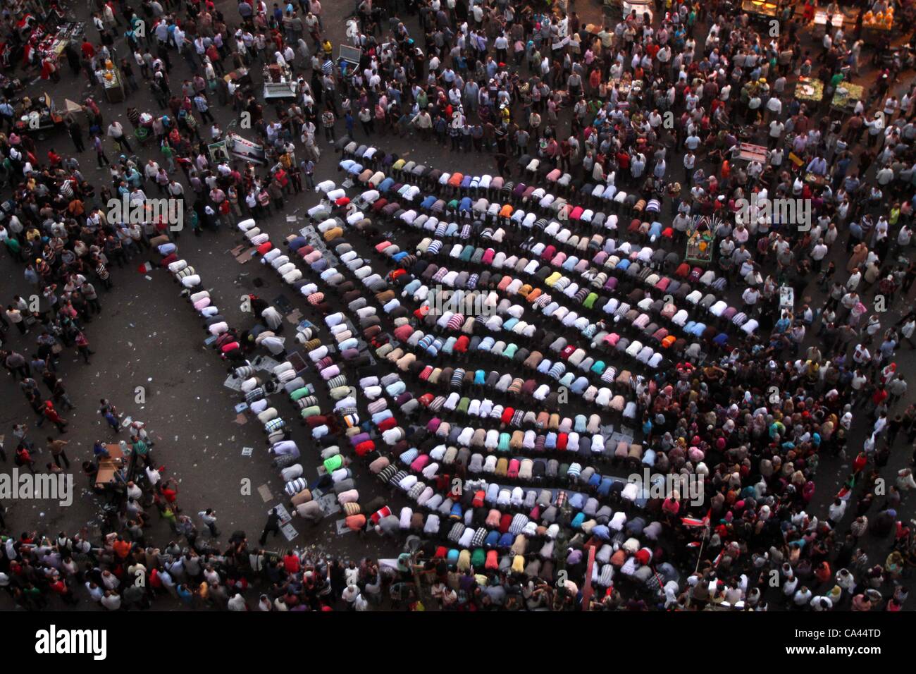 June 3, 2012 - Cairo, Cairo, Egypt - Protesters pray during a protest at Tahrir square in Cairo June 3, 2012. Egyptian pro-democracy campaigners called for a new uprising on Sunday, enraged that a court had spared former leader Hosni Mubarak his life over the killing of protesters during the street  Stock Photo