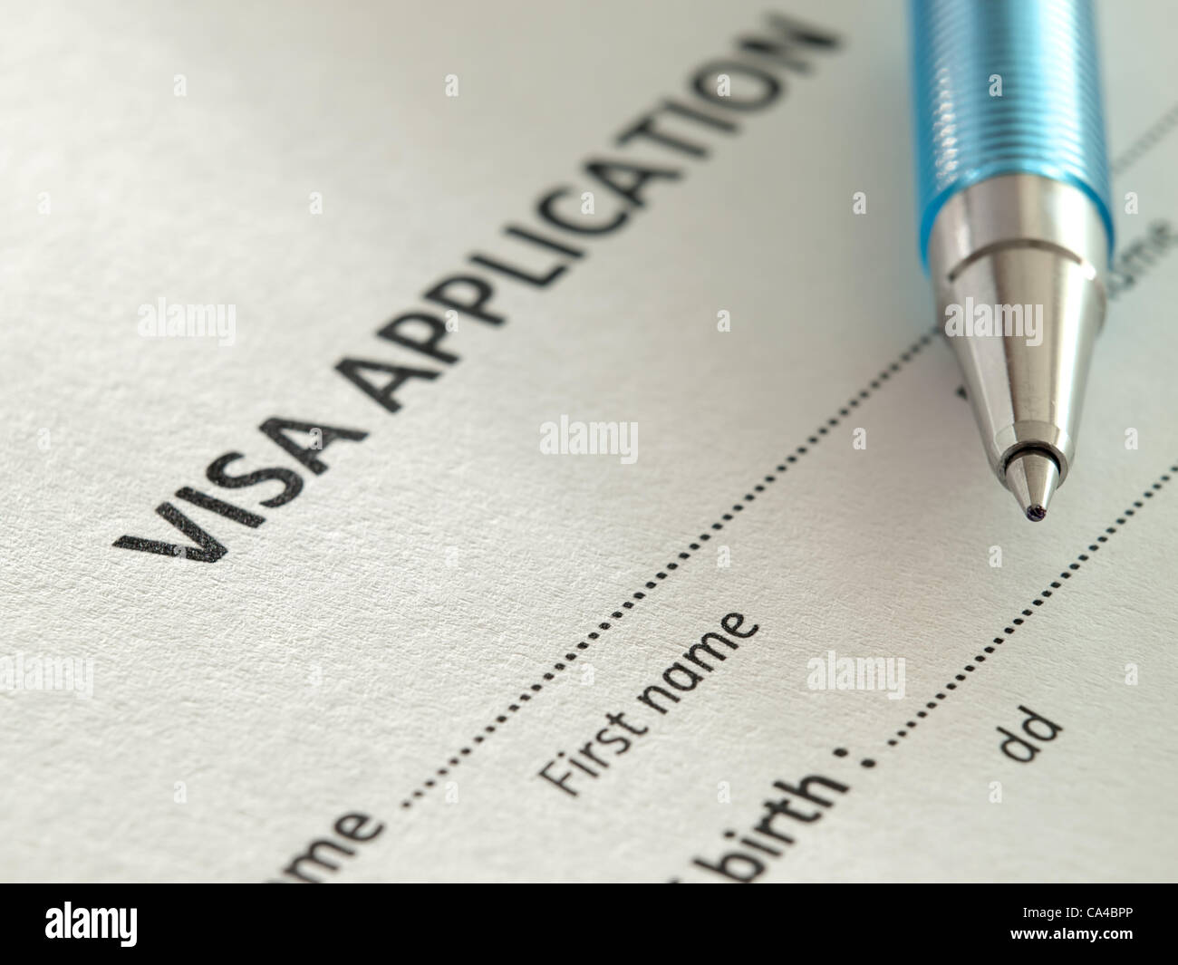 VIsa application form with pen,closeup,for immigration,travel,social issues themes Stock Photo