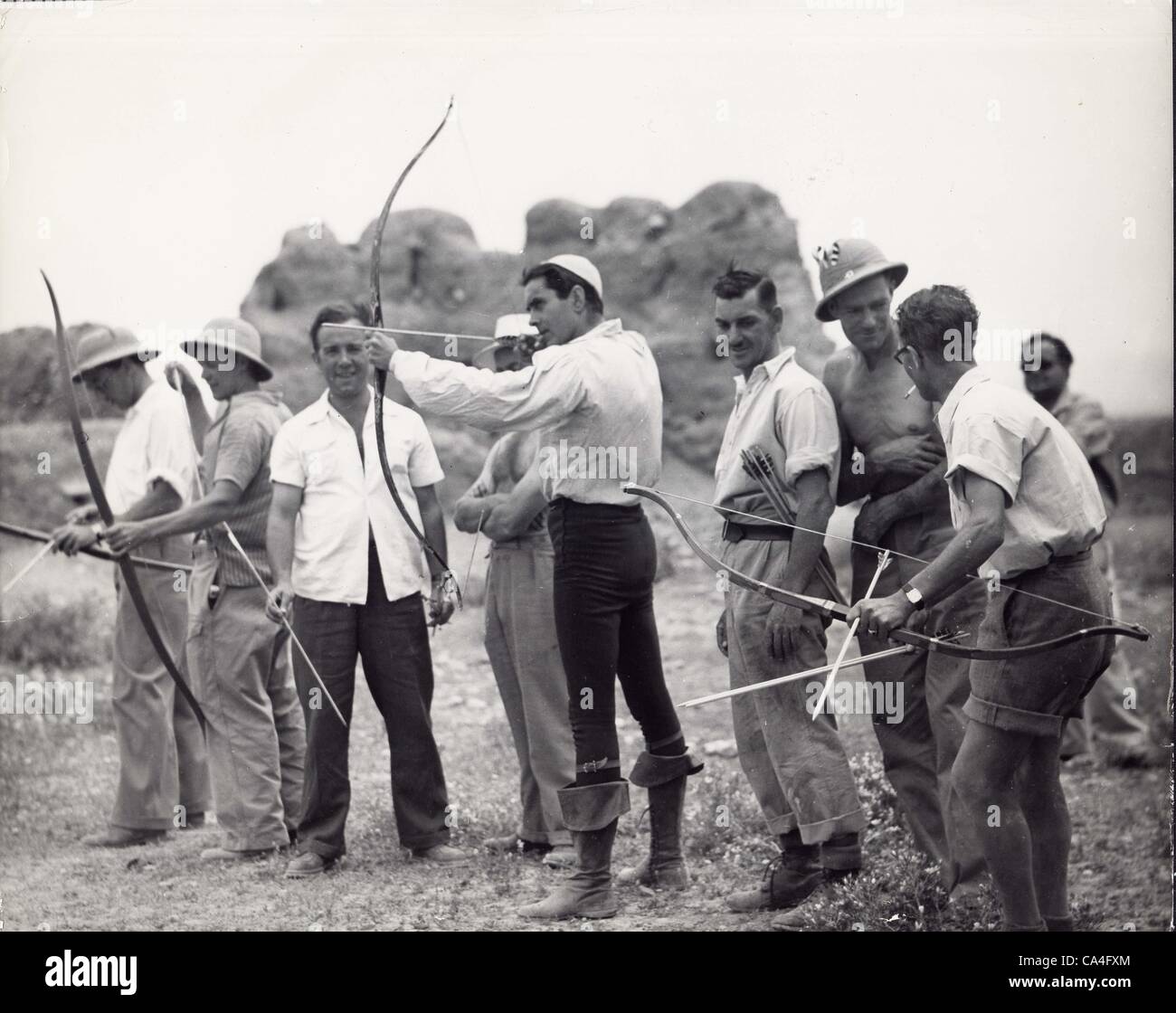 TYRONE POWER (center) takes over from one of the archers who are being used in 20th's The Black Rose. The picture , from the best selling novel, is being made in North Africa.Supplied by   Photos inc.(Credit Image: Â© Supplied By Globe Photos Inc/Globe Photos/ZUMAPRESS.com) Stock Photo