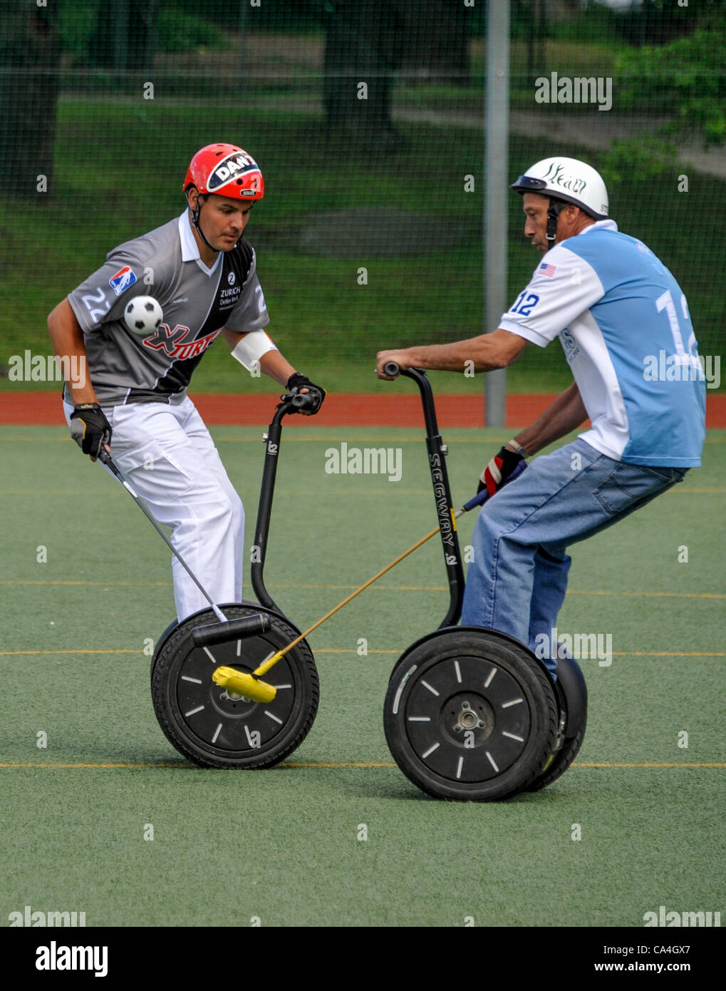 Stockholm, Sweden. Wed 6th June 2012.  Segway Polo World Cup. 'X-Turtles' from Koln, Germany plays 'The Originals', in Blue from California, USA Stock Photo