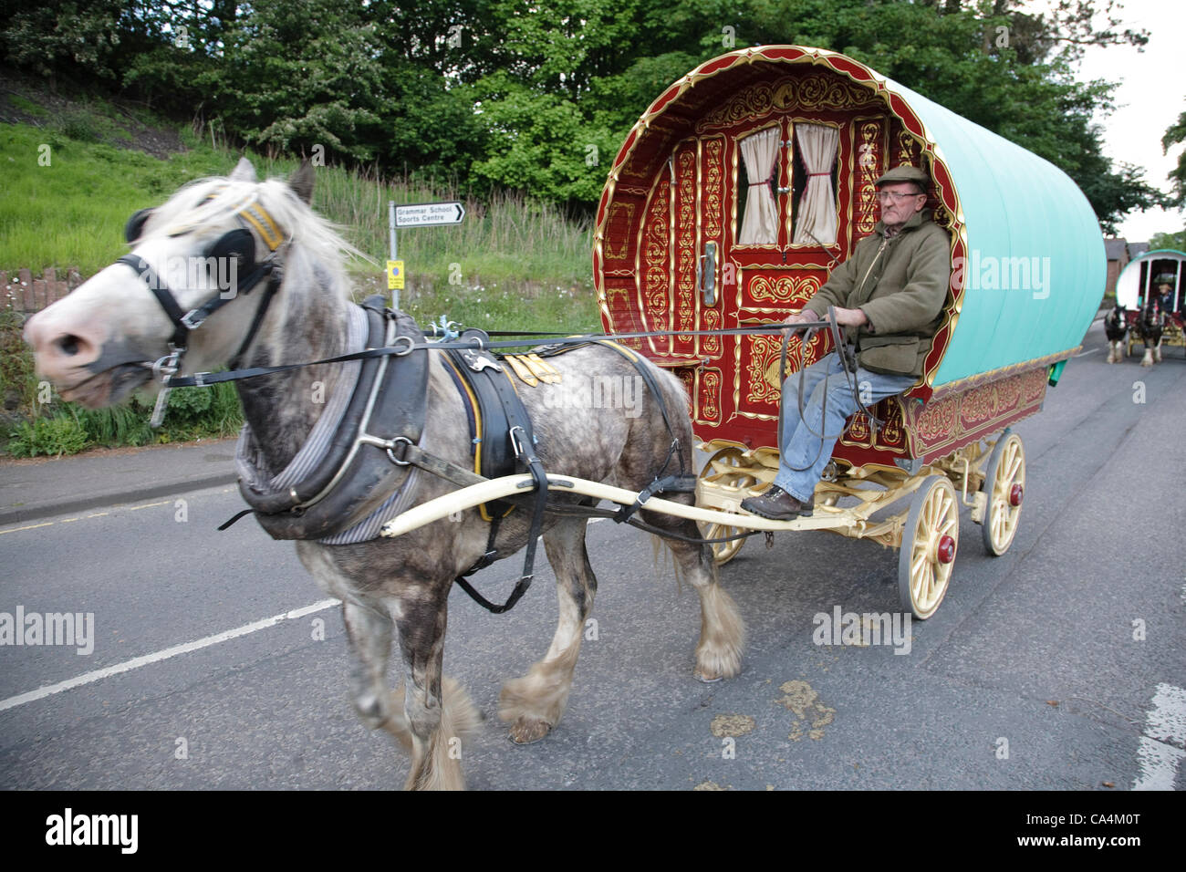 Wednesday 6th June 2012 at Appleby, Cumbria, England, UK. Horse drawn bow-top wagons arrive from all over the UK for Appleby Fair, the biggest annual gathering of Gypsies and Travellers in Europe. Trevor Jones (pictured)  has spent three weeks on the road to reach the fair from The Wirral. The fair Stock Photo