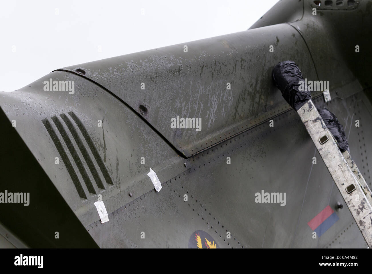 2012-06-07. Stanwick, Northamptonshire, UK. RAF Merlin mk3 helicopter grounded at a field in Stanwick on 06-06-2012 due to a loose panel near the rear rotor. After the repairs they hope to return to RAF Benson later this morning. Stock Photo