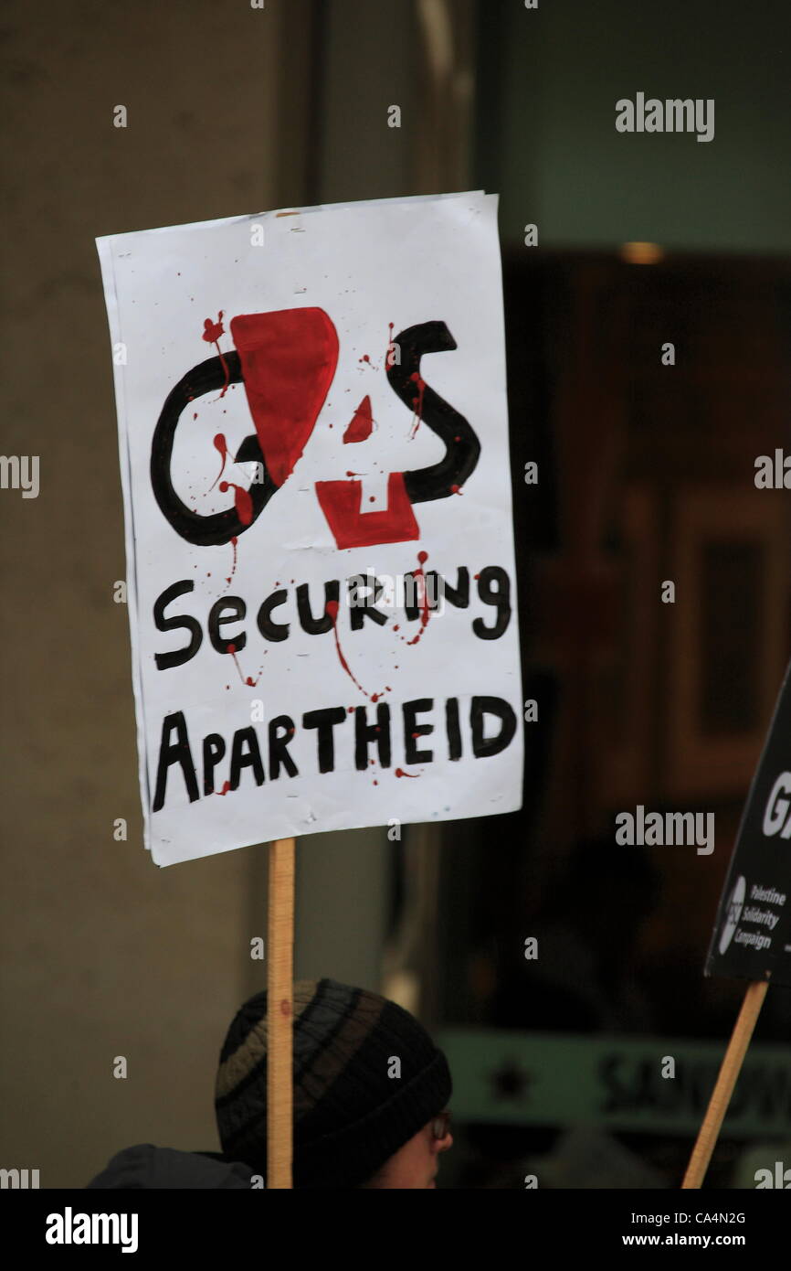 London, UK. Thursday 7th June 2012. Sign at protest. Activists from different movements gathered out side London Stock Exchange, Paternoster Square, London where the private security company 'G4S' held the Annual General Meeting. Protesters accuse G4S of human rights abuse throughout the world. Stock Photo