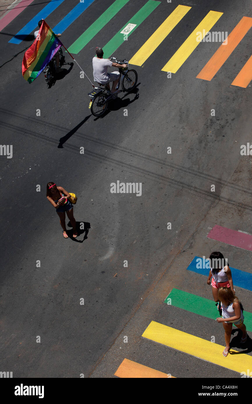 Crosswalks painted with the rainbow colors in Bugrashov street during the annual LGBT Tel Aviv pride parade also called 'Love Parade' as part of the international observance of Gay Pride Month. Israel Stock Photo