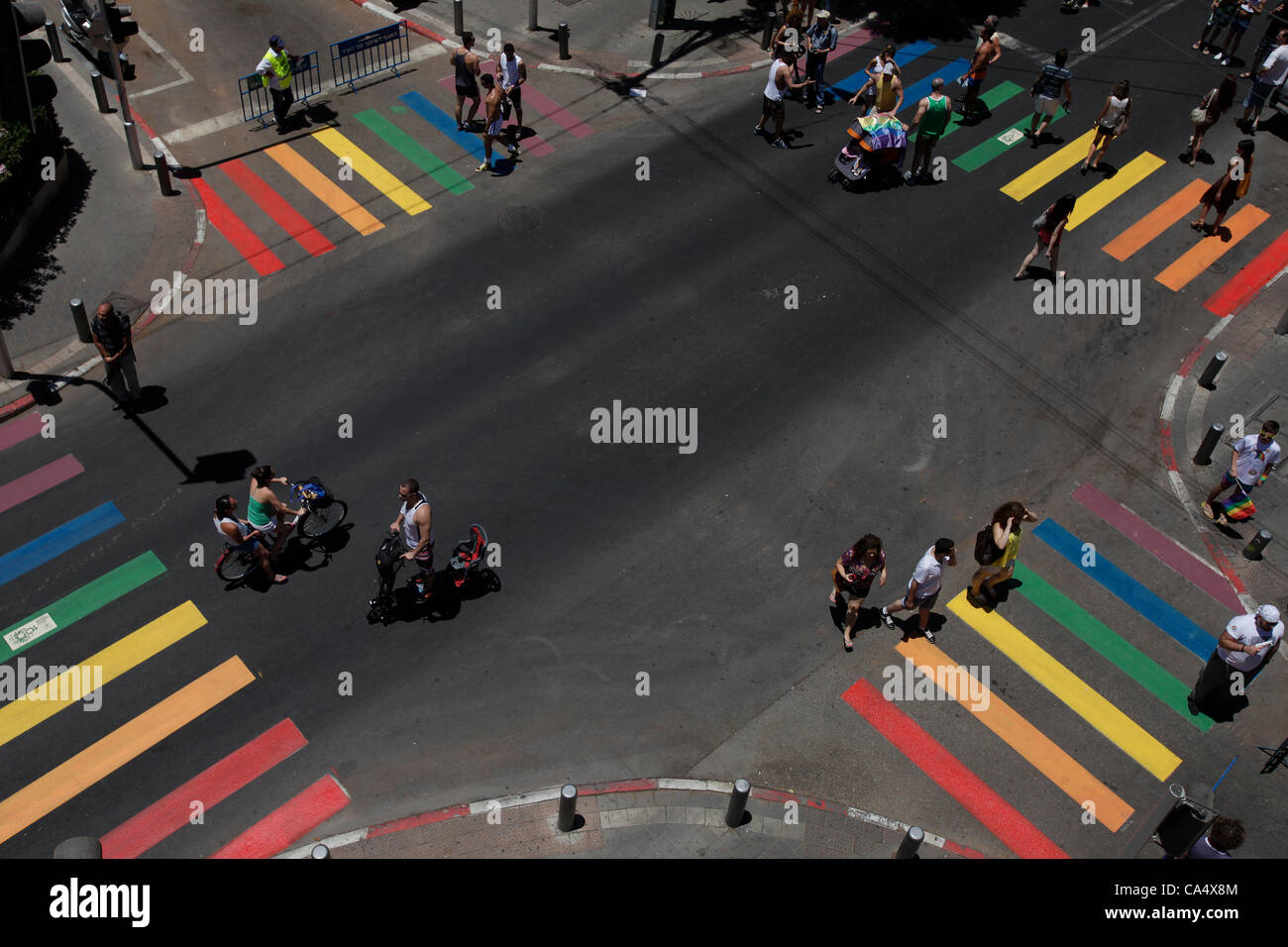 Crosswalks painted with the rainbow colors in Bugrashov street during the annual LGBT Tel Aviv pride parade also called 'Love Parade' as part of the international observance of Gay Pride Month. Israel Stock Photo