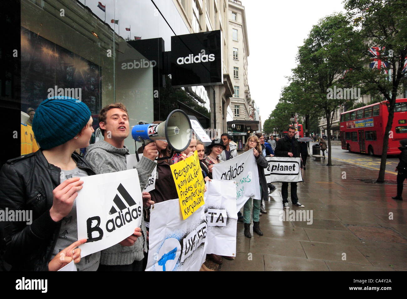 8th June 2012 UK Feminista protest at Adidas store Oxford Street London. The group claim that Adidas owe Indonesian women workers some $1.8m in wages following the closure of of