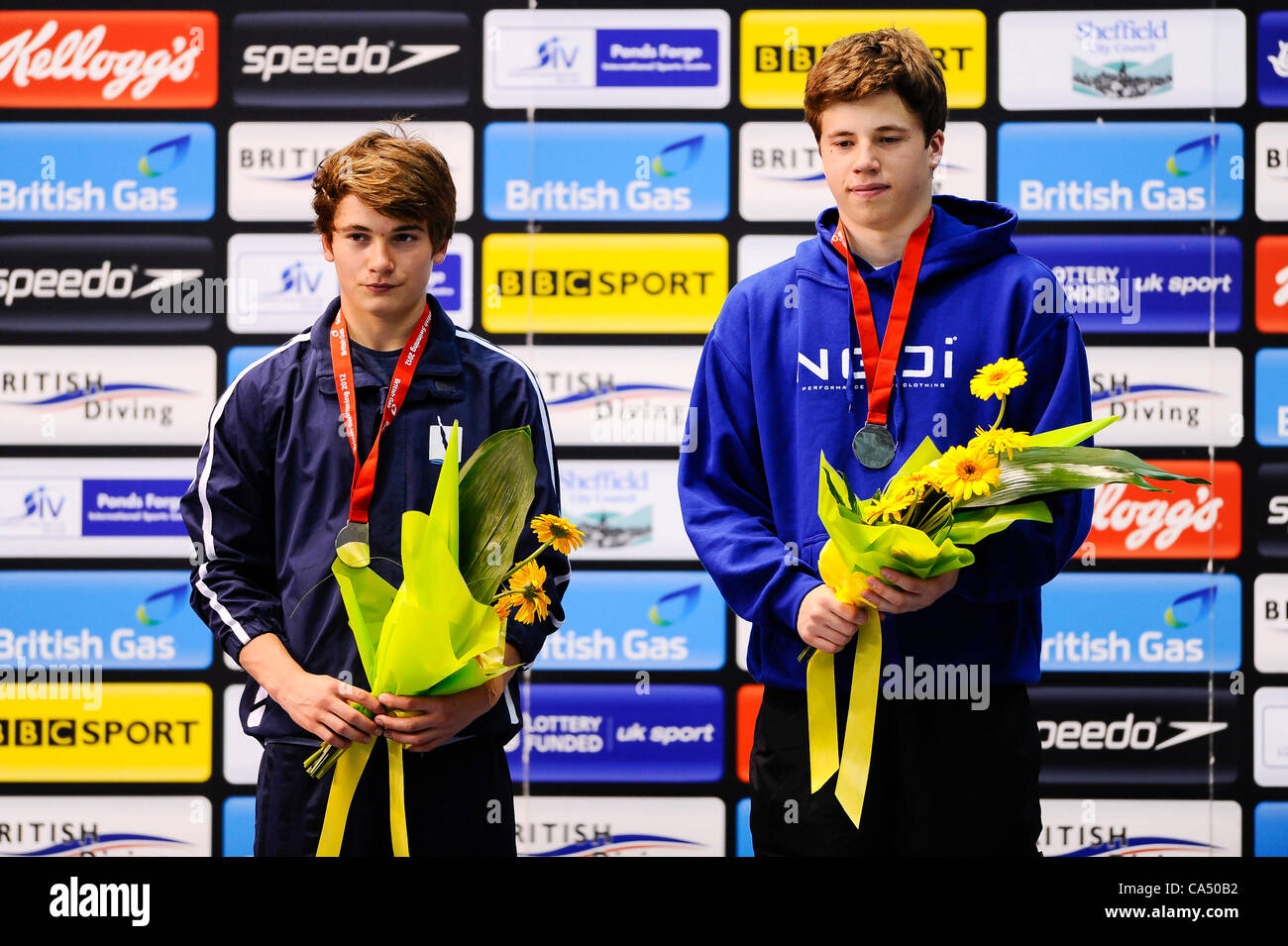 08.06.2012 Sheffield, England. Freddie Woodward and Daniel Goodfellow (City of Sheffield DC and Cambridge Dive Team) collect their silver medals after finishing second in the Mens 3m Synchro Springboard Final on Day 1 of the 2012 British Gas Diving Championships (and Team GB Olympic Squad Selection  Stock Photo