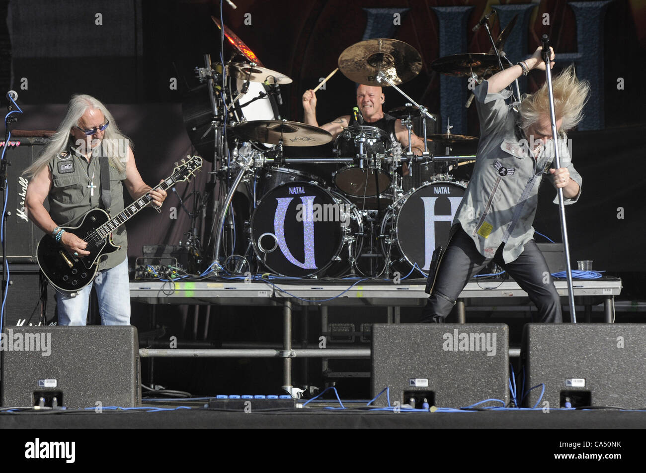 British rock band Uriah Heep during concert at the Metalfest Open Air 2012 in Pilsen, Czech Republic on June 8, 2012. Bernie Shaw (right), Mick Box (left), drummer Russell Gilbrook. (CTK Photo/Petr Eret) Stock Photo