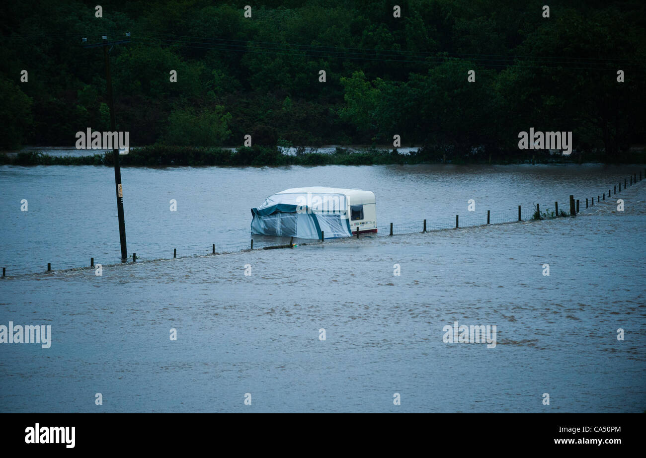 Two days of constant rain lead to the River Rheidol overflowing its banks near Aberystwyth. Caravans and tents were partly submerged at the Grovenor Caravan site on the outskirts of the town. Aberystwyth Wales UK, Friday 8 June 2012 Stock Photo