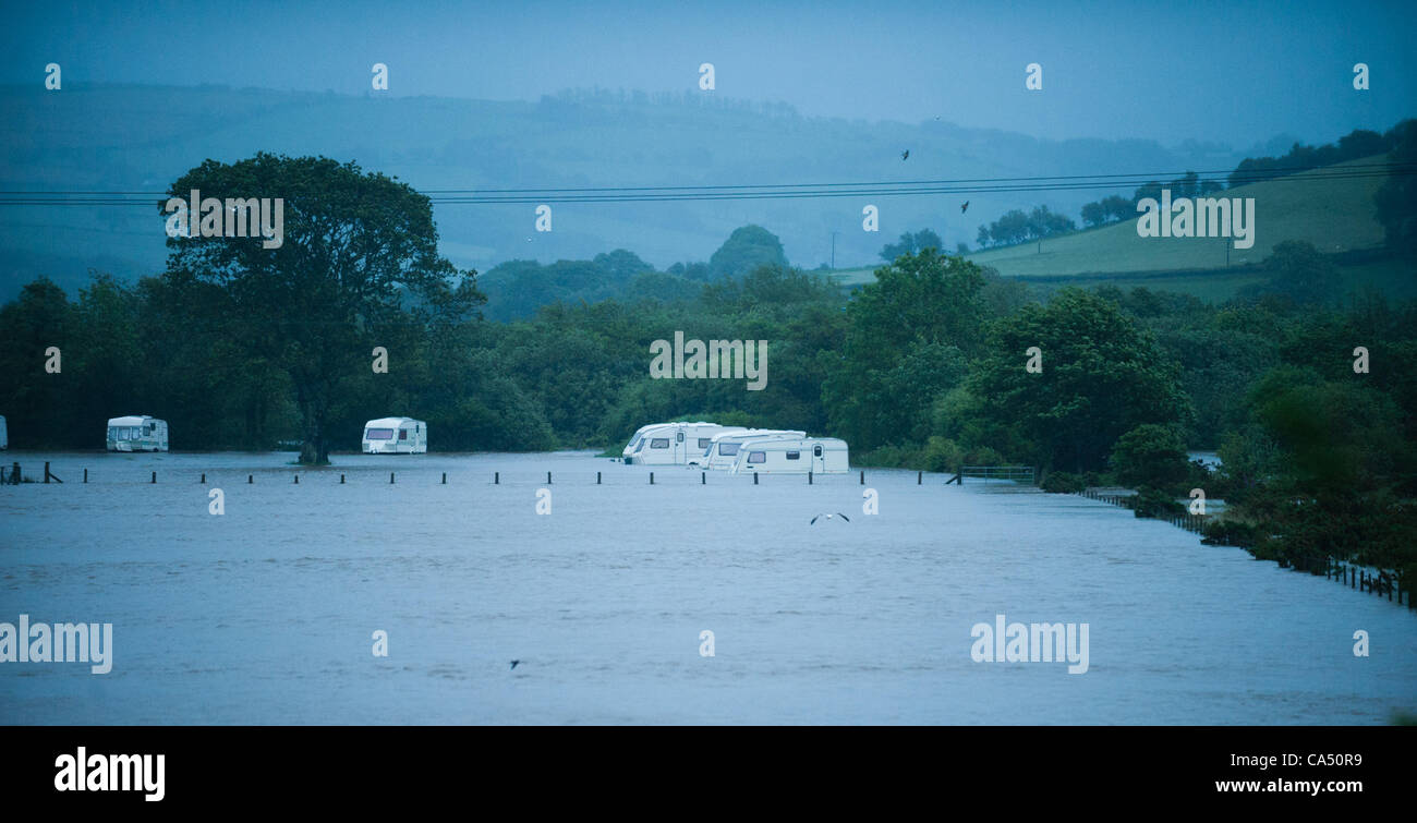 Two days of constant rain lead to the River Rheidol overflowing its banks near Aberystwyth. Caravans and tents were partly submerged at the Grovenor Caravan site on the outskirts of the town. Aberystwyth Wales UK, Friday 8 June 2012 Stock Photo