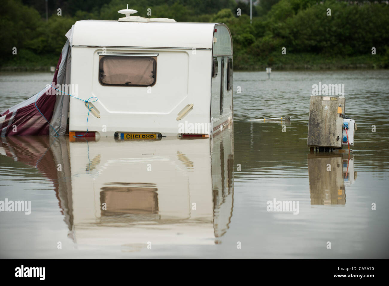 Sunday 10 June 2012. Aberystwyth Holiday Village following the flash floods that hit the Aberystwyth area on Saturday 9 June 2012.  The River Rheidol which flows along the edge of the site burst it banks and flooded the campsite following two days of torrential rain photo ©keith morris Stock Photo