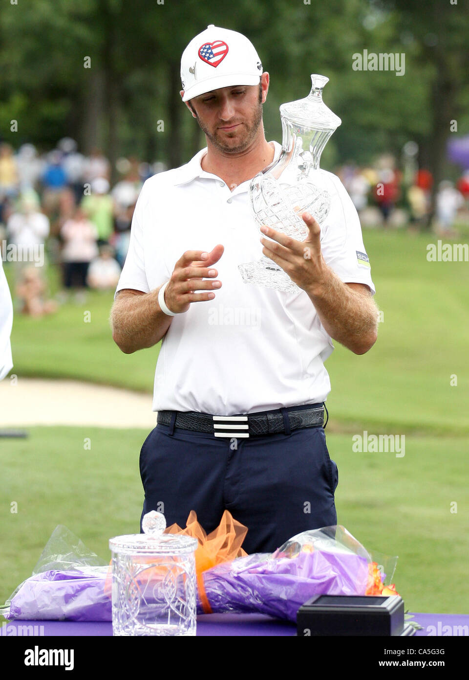 10.06.2012. Memphis, USA.  Dustin Johnson accepting championship trophy after winning the FedEx St. Jude Classic at TPC Southwind Memphis, TN. Stock Photo