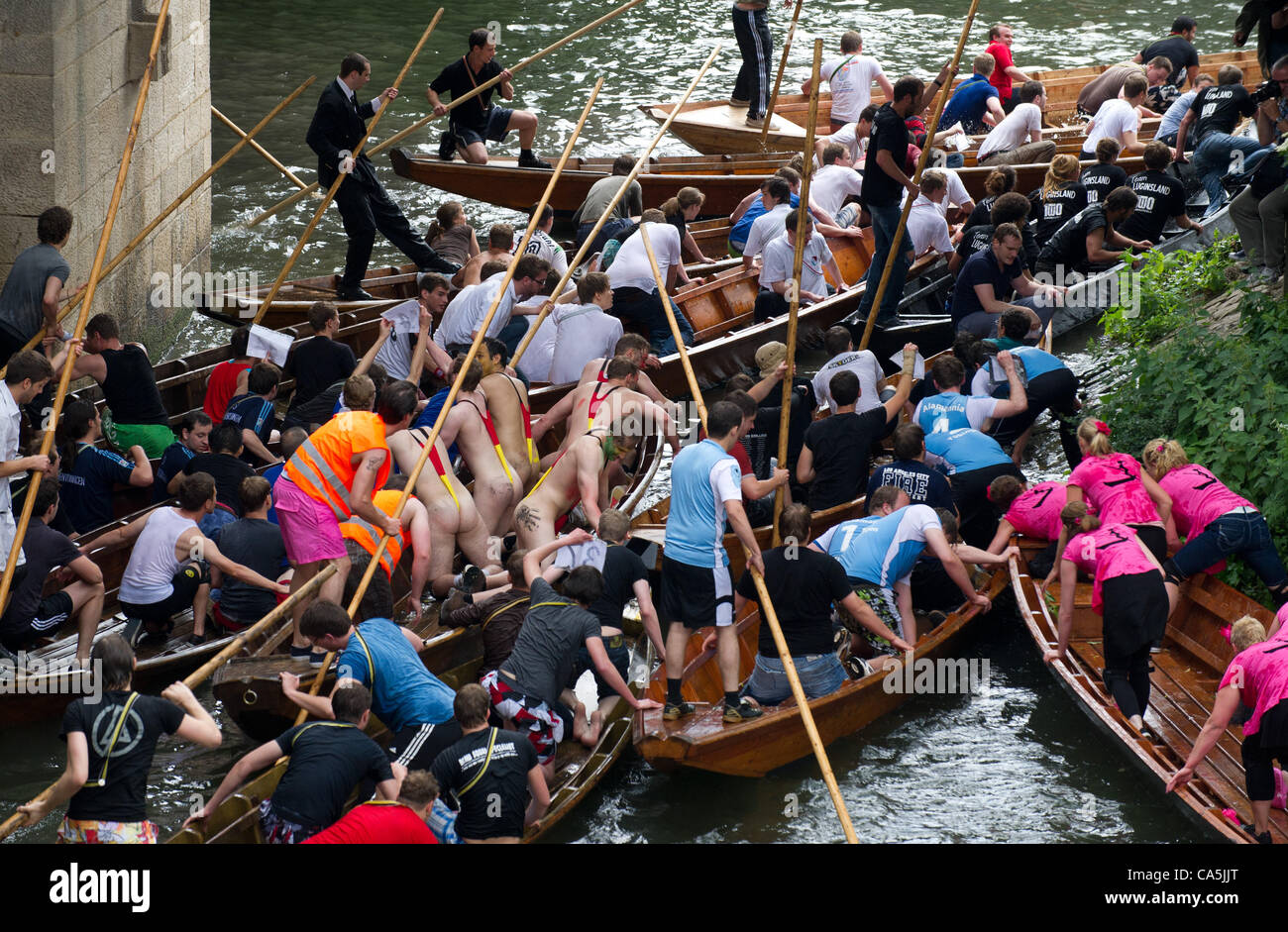 07.06.2012. Tuebingen, Germany.  Several punt boats try to pass a bottleneck during the fancy dress parade of the punt boat race (Stocherkahnrennen) on the river Neckar in tuebingen, Germany, 07 June 2012. Around 50 punt boats competed in this year's traditional punt boat race. Stock Photo