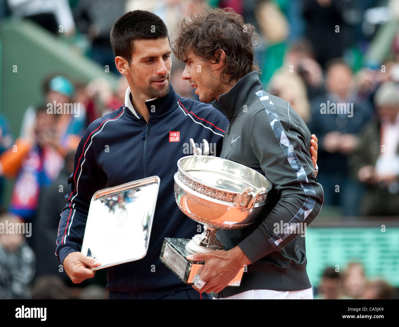 11.06.2012. Roland garros, Paris, France. Novak Djokovic of Serbia and  Rafael Nadal of Spain have a private word during the trophy presentation  ceremony after Nadal defeated Serbia's Novak Djokovic in the final