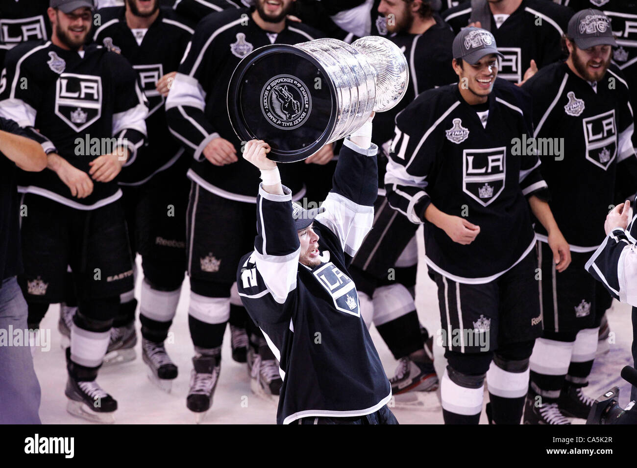 11.06.2012.Los Angeles Staples Center, USA. Los Angeles Kings right wing  forward #23 Dustin Brown C (USA) celebrates with the Stanley Cup The LA  Kings won the game 6-1 to win the Stanly
