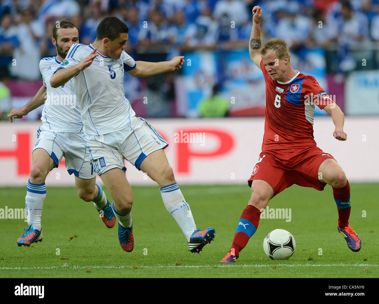 Greek Dimitris Salpingidis and Kyriakos Papadopulos and Czech David Limbersky during the Euro 2012 soccer championship Group A match between Greece and Czech Republic in Wroclaw, Poland, Tuesday, June 12, 2012. (CTK Photo/Katerina Sulova) Stock Photo