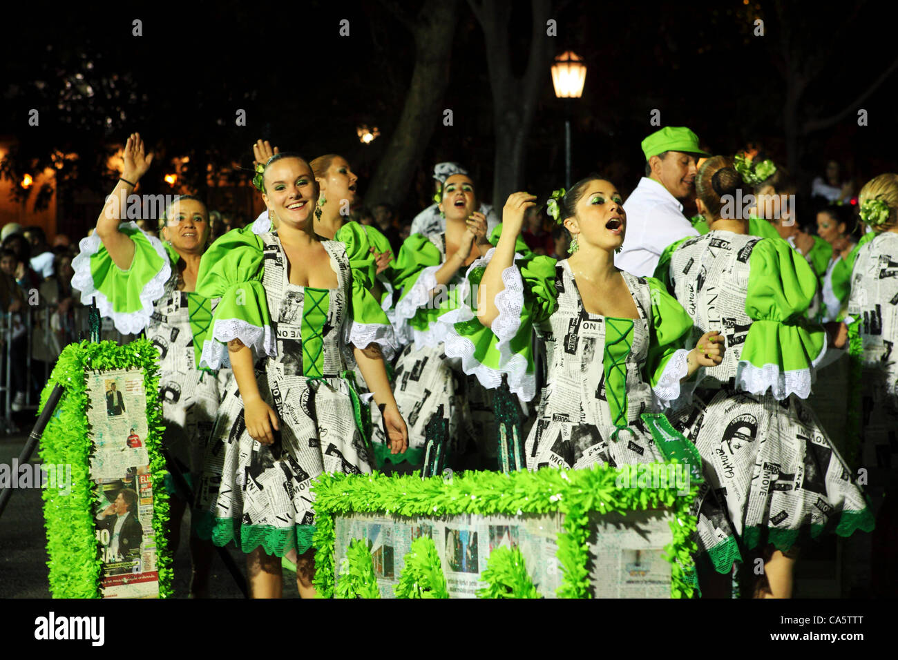 People take part in the annual costume parade known as the "Marchas