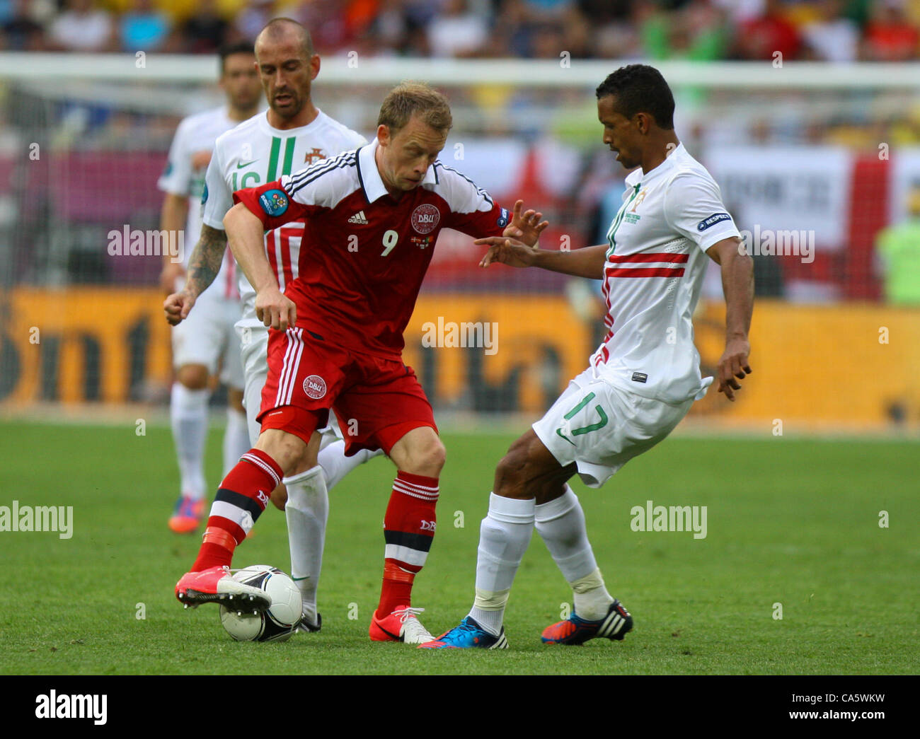 13.06.2012. Lviv, Ukraine. EURO 2012, FOOTBALL EUROPEAN Championship, Denmark versus Portugal. MICHAEL KROHN-DEHLI (DEN), RAUL MEIRELES, and NANI (POR) Stock Photo