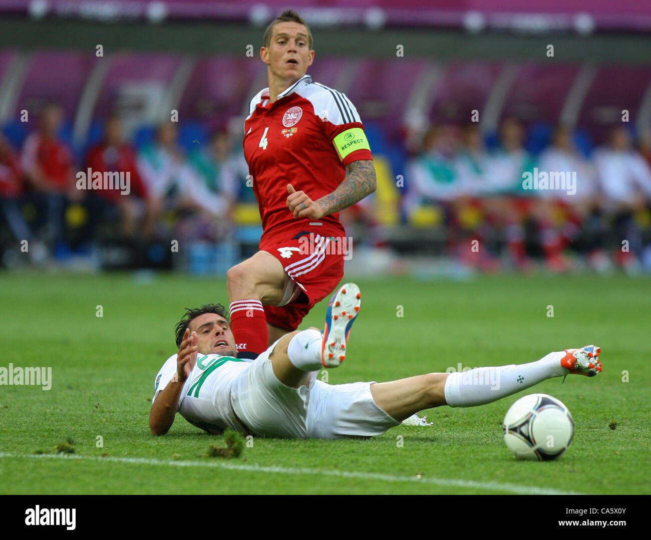 13.06.2012. Lviv, Ukraine. EURO 2012, FOOTBALL EUROPEAN Championship, Denmark versus Portugal. DANIEL AGGER (DEN)tackles HELDER POSTIGA (POR)  Portugal won the game by 3-2. Stock Photo