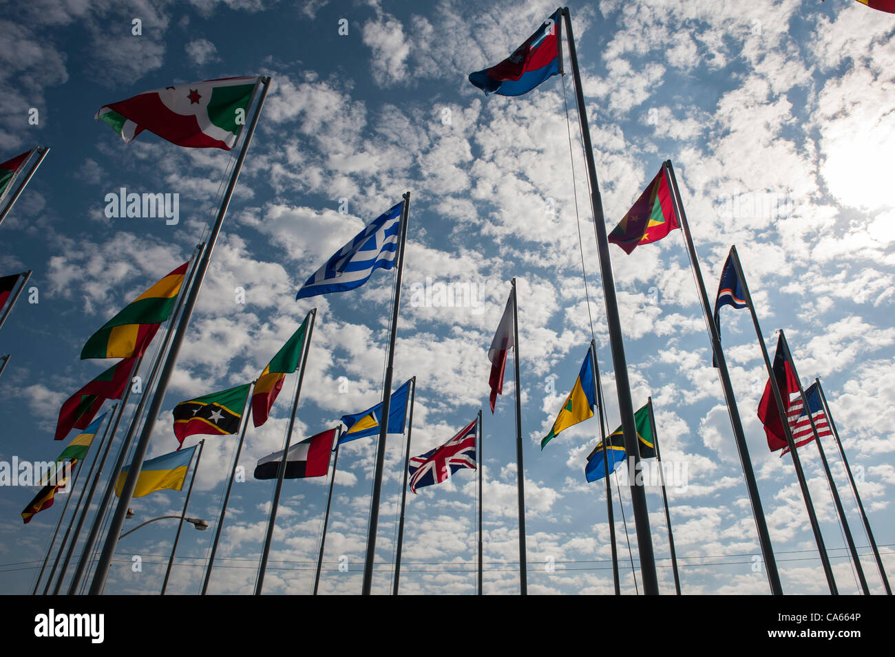 Rio de Janeiro, Brazil, Flags of several nations including the United Kingdom in the grounds of the Rio Centre conference venue. Photo © Sue Cunningham. Stock Photo