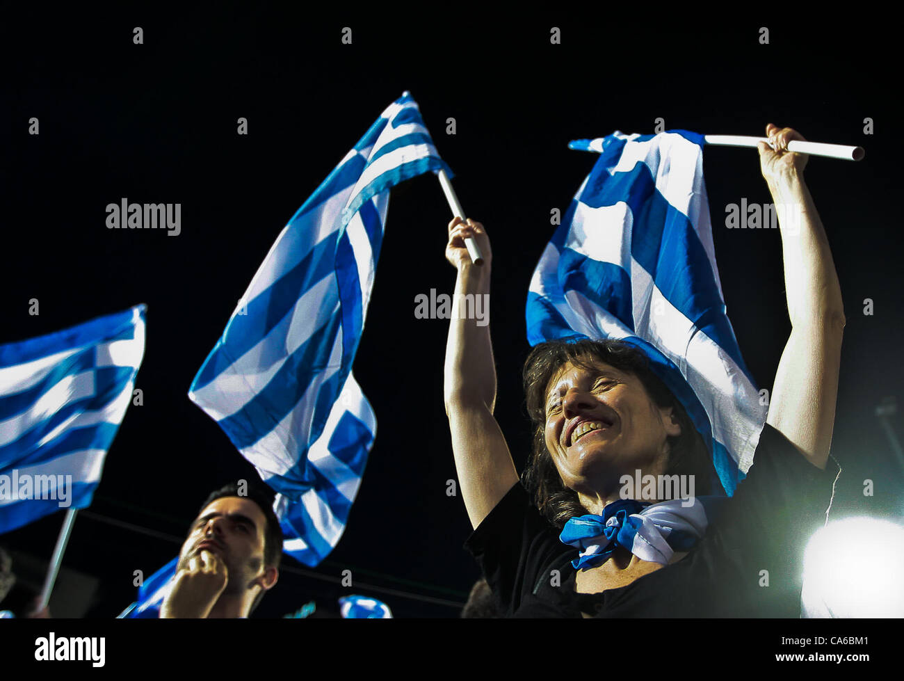 June 16, 2012 - Athens, Greece - Supporters of Antonis Samaras and the New Democracy party listen their leader's speech during the party's main pre-election rally in the central Athens Syntagma square on June 15, 2012. As Greece heads for a momentous electoral battle that could decide whether it sta Stock Photo