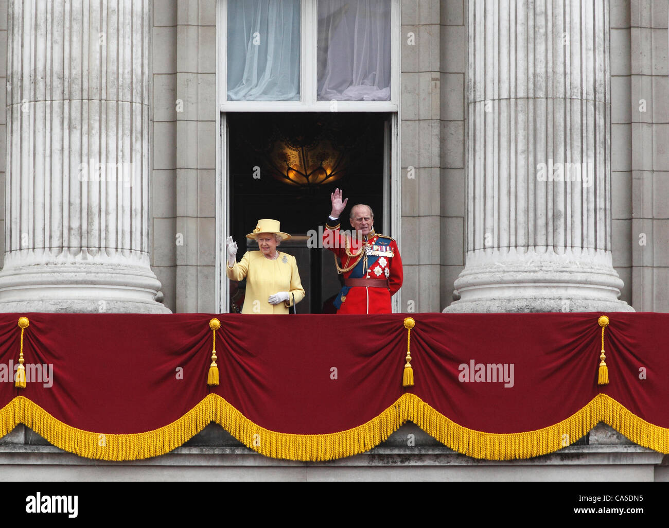 London, UK. 16 June, 2012. Queen Elizabeth II  and Prince Philip wave from the Balcony of Buckingham Palace  at the Trooping of the Colour Ceremony  June 2012 Stock Photo