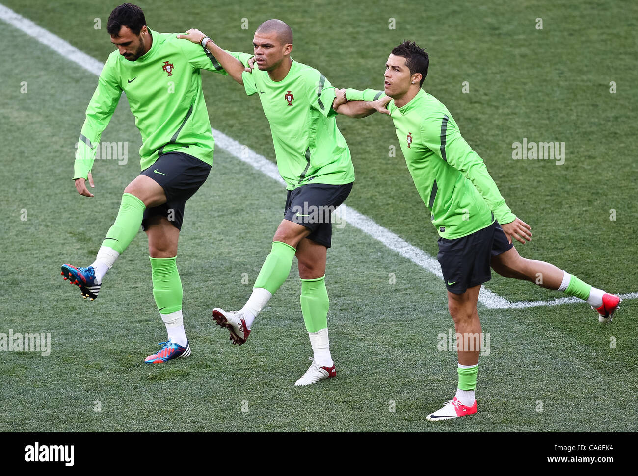 16.06.2012.  UKRAINE, Kharkiv Portugal´s players Cristiano Ronaldo (R), Pepe (C) and  Hugo Almeida  takes part in a training session at the Metalist Stadium in Kharkiv on June 16, 2012 during the Euro 2012 football championships. Stock Photo