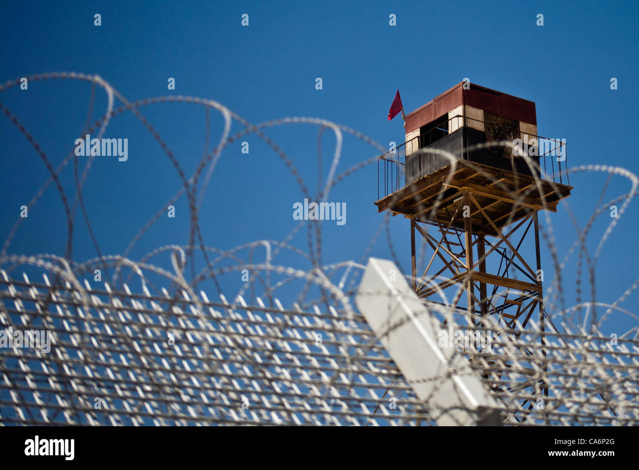 File photo: Egyptian military lookout post on Egyptian side of border adjacent to new Hour Glass fence erected on Israeli side. Negev, Israel. 3-Apr-2012. Stock Photo