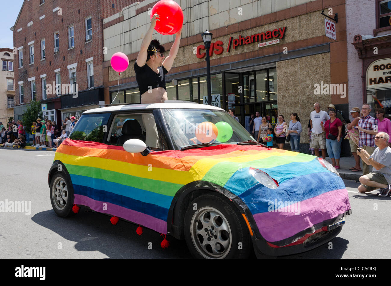 Hudson, New York, Saturday, June 16, 2012.  Parade participant dancing as the draped car rolled through Warren Street's 200 block Stock Photo