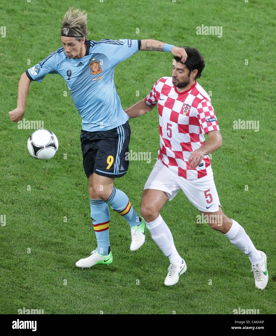 18.06.2012. Gdansk, Poland.  Croatia's Vedran Corluka and Spain's Fernando Torres (L) vie for the ball during UEFA EURO 2012 group C soccer match Spain vs Italy at Arena Gdansk in Gdansk, Poland, 18 June 2012. Stock Photo