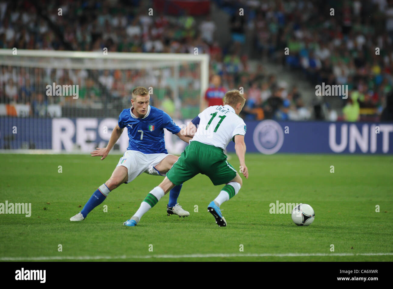 18.06.2012 , Poznan, Poland.Damien Duff (Fulham FC) in action for Rep of Ireland and Ignazio Abate (AC Milan) in action for Italy during the European Championship Group C game between Italy and Ireland from the Municipal Stadium. Stock Photo
